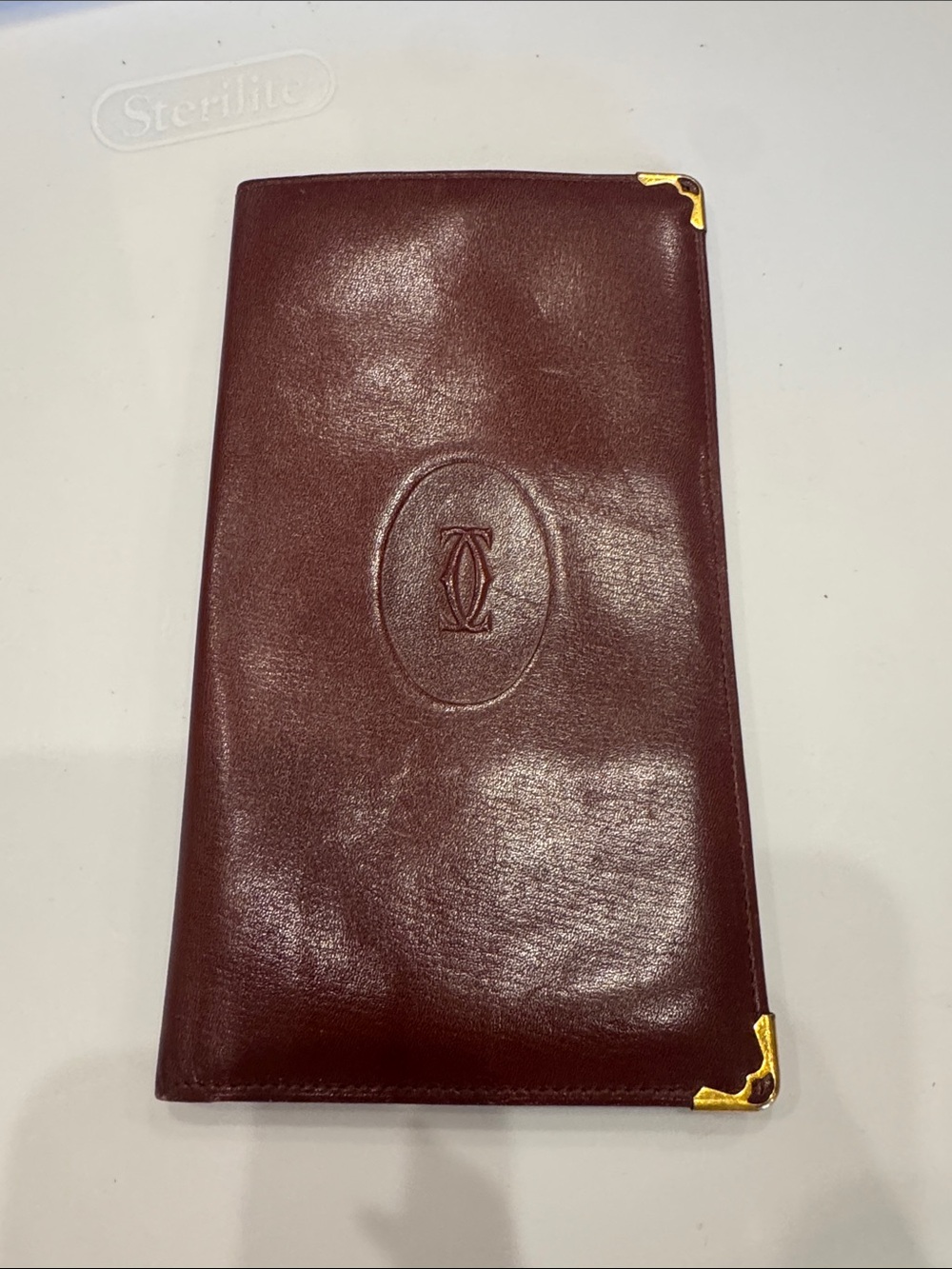 Cartier Burgundy Leather Long Wallet with Gold Corner Accents